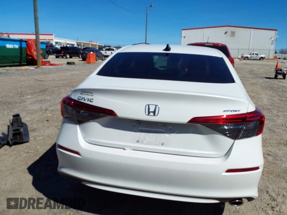 2023 Honda Civic Sport with VIN 2HGFE2F51PH513811, listed as a IAAI auction lot 41701450 with 33,933 mi miles and . Bid and sale history available at DreamBid. Image 17.