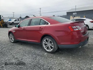 2013 Ford Taurus SEL with VIN 1FAHP2H81DG115553, listed as a Copart auction lot 51430945 with 157,548 mi miles and Salvage Title. Bid and sale history available at DreamBid. Image 2.