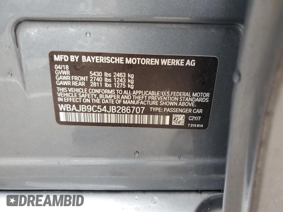 2018 BMW 5 Series M550i xDrive with VIN WBAJB9C54JB286707, listed as a Copart auction lot 49158435 with 74,307 mi miles and Salvage title. Bid and sale history available at DreamBid. Image 14.
