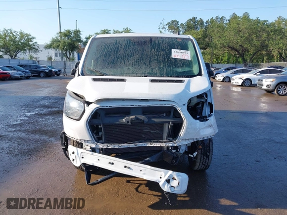 2021 Ford Transit Cargo with VIN 1FTBR1Y82MKA53386, listed as a IAAI auction lot 42058972 with 98,677 mi miles. Bid and sale history available at carsss.com. Image 13.