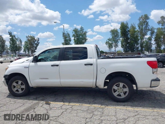 2008 Toyota Tundra z VIN 5TFEV54128X049128, wystawiony jako IAAI lot #42249292 z przebiegiem 313 233 mil mil oraz . Historia ofert i sprzedaży dostępna na DreamBid. Obrazek 14.