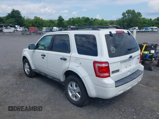 2012 Ford Escape XLT z VIN 1FMCU9D77CKB60829, wystawiony jako IAAI lot #42653677 z przebiegiem 151 116 mil mil oraz . Historia ofert i sprzedaży dostępna na DreamBid. Obrazek 3.