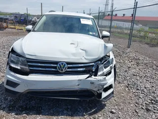 2018 Volkswagen Tiguan SEL with VIN 3VV3B7AX2JM060292, listed as a IAAI auction lot 42274534 with 97,604 mi miles and . Bid and sale history available at DreamBid. Image 12.