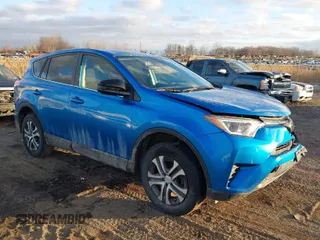 2018 Toyota RAV4 LE with VIN JTMBFREV4JJ717092, listed as a IAAI auction lot 41492235 with 127,643 mi miles. Bid and sale history available at carsss.com. Image 1.