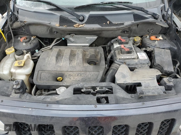 2014 Jeep Patriot Sport with VIN 1C4NJRBB4ED602129, listed as a Copart auction lot 52609085 with 222,064 mi miles and Salvage Title. Bid and sale history available at DreamBid. Image 12.