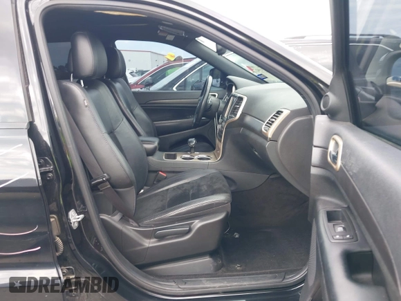 2015 Jeep Grand Cherokee Altitude z VIN 1C4RJFAGXFC659990, wystawiony jako IAAI lot #42331922 z przebiegiem 121 379 mil mil oraz . Historia ofert i sprzedaży dostępna na DreamBid. Obrazek 5.