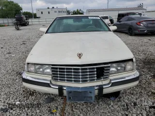 1995 Cadillac Seville Luxury SLS z VIN 1G6KS52Y7SU838169, wystawiony jako Copart lot #67941934 z przebiegiem 144 953 mil mil oraz Szkoda całkowita • Salvage title. Historia ofert i sprzedaży dostępna na DreamBid. Obrazek 5.
