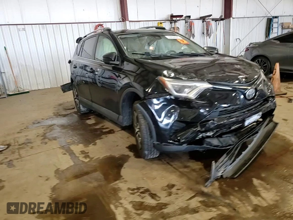 2018 Toyota RAV4 LE with VIN 2T3BFREV7JW717699, listed as a Copart auction lot 60656045 with Not provided miles and Salvage title. Bid and sale history available at DreamBid. Image 14.