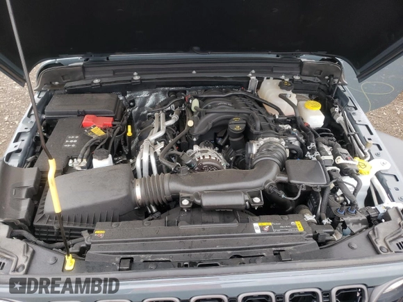 2024 Jeep Wrangler Sport S with VIN 1C4PJXDG1RW305304, listed as a Copart auction lot 57555635 with 5,705 mi miles and Salvage title. Bid and sale history available at DreamBid. Image 12.