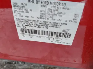 2020 Lincoln Nautilus Reserve z VIN 2LMPJ8KP8LBL22392, wystawiony jako Copart lot #57273145 z przebiegiem 21 457 mil mil oraz Szkoda całkowita • Salvage title. Historia ofert i sprzedaży dostępna na DreamBid. Obrazek 13.