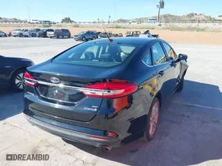 2018 Ford Fusion Hybrid SE with VIN 3FA6P0LU5JR257120, listed as a IAAI auction lot 41859050 with 142,524 mi miles. Bid and sale history available at carsss.com. Image 4.
