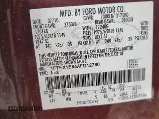 2010 Ford F-150 XL z VIN 1FTEX1E84AFD12780, wystawiony jako Copart lot #65169645 z przebiegiem 180 162 mil mil oraz Czysty tytuł • Clean title. Historia ofert i sprzedaży dostępna na DreamBid. Obrazek 13.