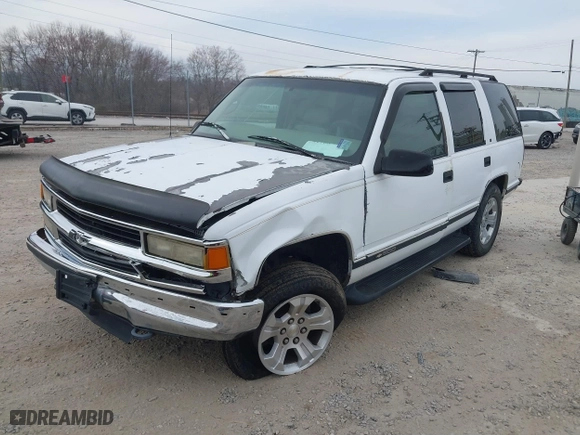 1997 Chevrolet Tahoe with VIN 1GNEK13R4VJ361515, listed as a IAAI auction lot 41768386 with 216,974 mi miles. Bid and sale history available at carsss.com. Image 2.