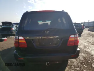 1999 Toyota Land Cruiser with VIN JT3HT05J5X0072564, listed as a Copart auction lot 77000044 with 312,428 mi miles and Salvage Title. Bid and sale history available at carsss.com. Image 6.