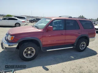 2000 Toyota 4Runner SR5 z VIN JT3GN86RXY0154204, wystawiony jako Copart lot #59130105 z przebiegiem 195 446 mil mil oraz Czysty tytuł • Clean title. Historia ofert i sprzedaży dostępna na DreamBid. Obrazek 1.