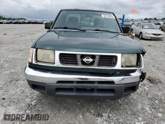 2000 Nissan Frontier XE with VIN 1N6DD26SXYC400648, listed as a Copart auction lot 58756855 with 148,051 mi miles and Salvage title. Bid and sale history available at DreamBid. Image 5.