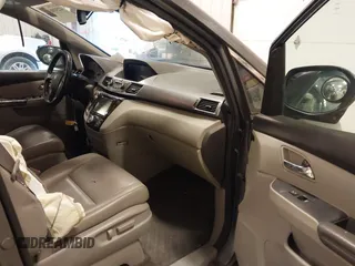 2014 Honda Odyssey EX-L with VIN 5FNRL5H67EB056983, listed as a IAAI auction lot 42318699 with 256,267 mi miles and . Bid and sale history available at DreamBid. Image 5.
