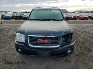 2005 GMC Envoy SLT with VIN 1GKDT13S552310799, listed as a Copart auction lot 43586125 with 182,928 mi miles and Salvage Title. Bid and sale history available at carsss.com. Image 5.