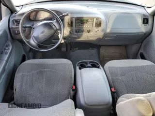 1999 Ford F-150 XL с VIN 1FTRX08L3XKA96271, выставлен на аукционе Copart как лот 49238415 с пробегом 168 477 миль миль и Списание • Salvage title. История ставок и продаж доступна на DreamBid. Изображение 8.