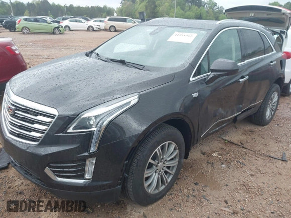 2019 Cadillac XT5 Luxury AWD z VIN 1GYKNDRS6KZ113420, wystawiony jako IAAI lot #41951065 z przebiegiem 56 360 mil mil oraz . Historia ofert i sprzedaży dostępna na DreamBid. Obrazek 17.