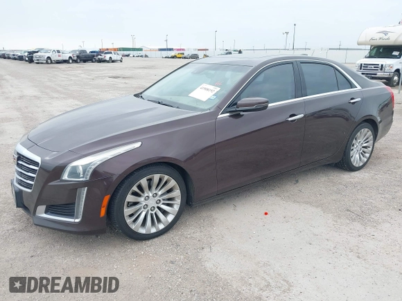 2016 Cadillac CTS Luxury Collection RWD z VIN 1G6AR5SX7G0111806, wystawiony jako IAAI lot #41908192 z przebiegiem 86 309 mil mil oraz . Historia ofert i sprzedaży dostępna na DreamBid. Obrazek 17.