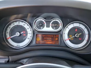 2014 FIAT 500L Lounge with VIN ZFBCFACH6EZ029883, listed as a Copart auction lot 80558044 with 116,997 mi miles and Salvage Title. Bid and sale history available at carsss.com. Image 9.