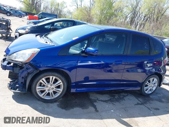 2010 Honda Fit Sport with VIN JHMGE8H4XAS018807, listed as a IAAI auction lot 41990369 with 63,151 mi miles. Bid and sale history available at carsss.com. Image 15.
