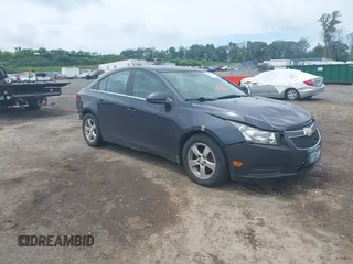 2014 Chevrolet Cruze 1LT with VIN 1G1PC5SB9E7466910, listed as a IAAI auction lot 42658455 with 167,614 mi miles and . Bid and sale history available at DreamBid. Image 1.
