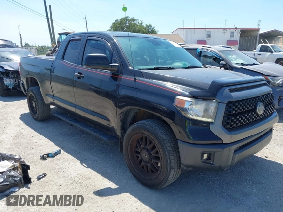 2019 Toyota Tundra SR with VIN 5TFUY5F13KX852912, listed as a IAAI auction lot 42327399 with 124,193 mi miles and . Bid and sale history available at DreamBid. Image 1.