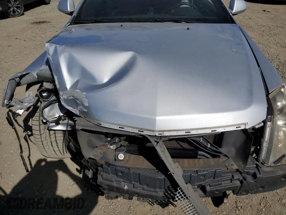 2011 Cadillac CTS z VIN 1G6DA1ED4B0132278, wystawiony jako Copart lot #52191915 z przebiegiem 115 933 mil mil oraz Szkoda całkowita • Salvage title. Historia ofert i sprzedaży dostępna na DreamBid. Obrazek 11.