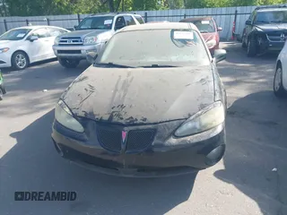 2007 Pontiac Grand Prix z VIN 2G2WP552671162313, wystawiony jako IAAI lot #42377703 z przebiegiem 185 905 mil mil oraz . Historia ofert i sprzedaży dostępna na DreamBid. Obrazek 6.