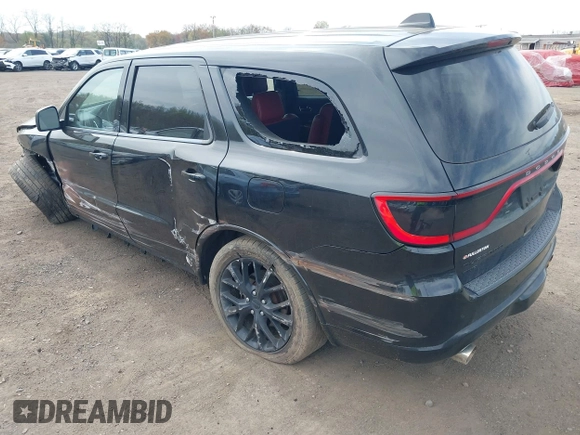 2015 Dodge Durango R/T with VIN 1C4SDJCT3FC156310, listed as a IAAI auction lot 42061041 with 99,621 mi miles and . Bid and sale history available at carsss.com. Image 3.