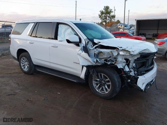 2021 Chevrolet Tahoe LT with VIN 1GNSCNKD9MR173604, listed as a IAAI auction lot 41036568 with 95,962 mi miles. Bid and sale history available at carsss.com. Image 1.
