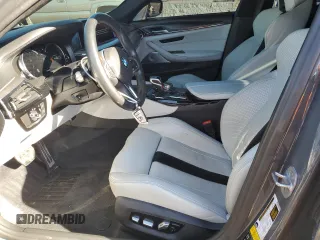 2019 BMW M5 z VIN WBSJF0C59KB285517, wystawiony jako Copart lot #88369385 z przebiegiem 51 700 mil mil oraz Szkoda całkowita • Salvage title. Historia ofert i sprzedaży dostępna na DreamBid. Obrazek 7.