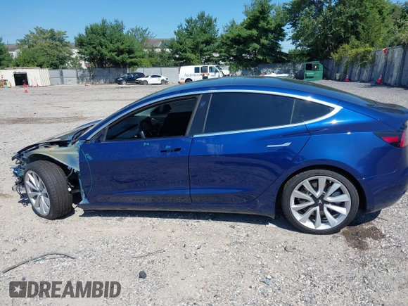 2019 Tesla Model 3 Mid Range with VIN 5YJ3E1EA6KF402308, listed as a IAAI auction lot 40077902 with 89,794 mi miles and . Bid and sale history available at carsss.com. Image 14.