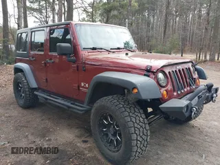 2007 Jeep Wrangler Unlimited X with VIN 1J4GA39177L195364, listed as a IAAI auction lot 41208844 with 147,059 mi miles and . Bid and sale history available at DreamBid. Image 1.
