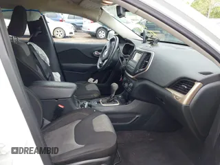 2016 Jeep Cherokee Sport z VIN 1C4PJMAS5GW268097, wystawiony jako IAAI lot #42211745 z przebiegiem 101 496 mil mil oraz . Historia ofert i sprzedaży dostępna na DreamBid. Obrazek 5.