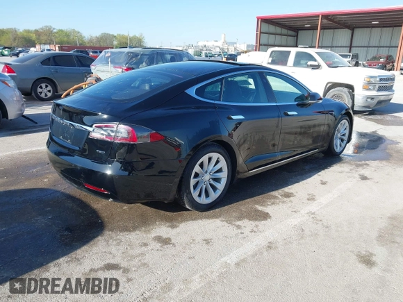 2017 Tesla Model S 100D with VIN 5YJSA1E27HF230508, listed as a IAAI auction lot 42040511 with 98,693 mi miles. Bid and sale history available at carsss.com. Image 4.