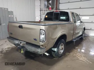 1999 Ford F-150 with VIN 1FTRX18W0XKA68363, listed as a IAAI auction lot 41524104 with 218,400 mi miles and . Bid and sale history available at DreamBid. Image 4.