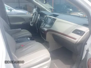 2014 Toyota Sienna XLE with VIN 5TDYK3DC2ES517663, listed as a IAAI auction lot 42171862 with 143,447 mi miles and . Bid and sale history available at DreamBid. Image 5.