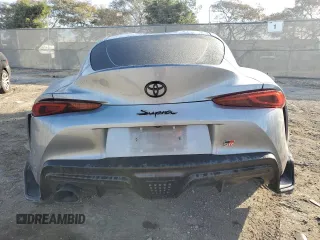 2022 Toyota Supra 3.0 z VIN WZ1DB0C0XNW046741, wystawiony jako Copart lot #43457735 z przebiegiem Nie podano mil oraz Szkody całkowita. Historia ofert i sprzedaży dostępna na DreamBid. Obrazek 6.