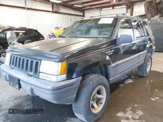 1995 Jeep Grand Cherokee Laredo z VIN 1J4GZ58Y3SC670696, wystawiony jako IAAI lot #42530934 z przebiegiem 165 658 mil mil oraz . Historia ofert i sprzedaży dostępna na DreamBid. Obrazek 17.