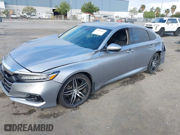 2021 Honda Accord Touring z VIN 1HGCV2F99MA032916, wystawiony jako IAAI lot #42019607 z przebiegiem 64 344 mil mil oraz . Historia ofert i sprzedaży dostępna na DreamBid. Obrazek 18.