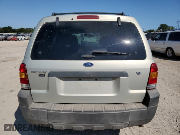 2006 Ford Escape XLT with VIN 1FMCU03116KA69312, listed as a Copart auction lot 70773514 with 164,079 mi miles and Salvage Title. Bid and sale history available at carsss.com. Image 6.