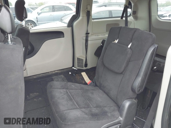 2014 Dodge Grand Caravan American Value with VIN 2C4RDGBG3ER104932, listed as a IAAI auction lot 42126784 with 171,206 mi miles and . Bid and sale history available at DreamBid. Image 8.