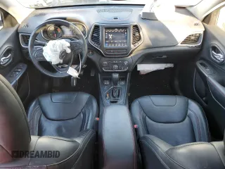 2019 Jeep Cherokee Trailhawk z VIN 1C4PJMBXXKD315140, wystawiony jako Copart lot #83298934 z przebiegiem 87 938 mil mil oraz Szkoda całkowita • Salvage title. Historia ofert i sprzedaży dostępna na DreamBid. Obrazek 8.