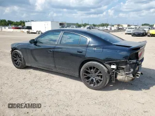 2015 Dodge Charger SXT with VIN 2C3CDXHG7FH721825, listed as a Copart auction lot 58076255 with 193,740 mi miles and Salvage title. Bid and sale history available at DreamBid. Image 2.