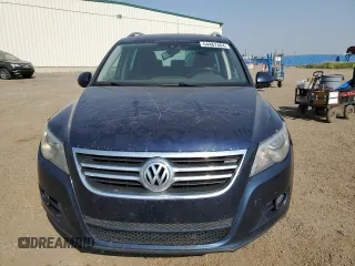 2011 Volkswagen Tiguan SEL with VIN WVGBV7AX1BW504132, listed as a Copart auction lot 64467484 with Not Provided miles and Salvage Title. Bid and sale history available at DreamBid. Image 5.