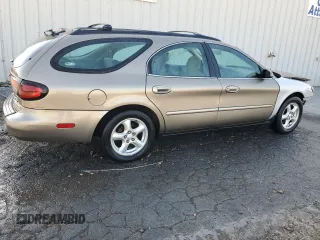 2002 Ford Taurus SE z VIN 1FAFP58S02G278065, wystawiony jako Copart lot #53030885 z przebiegiem 131 984 mil mil oraz Szkoda całkowita • Salvage title. Historia ofert i sprzedaży dostępna na DreamBid. Obrazek 3.