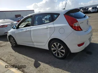 2015 Hyundai Accent Sport with VIN KMHCU5AE4FU205570, listed as a Copart auction lot 80708594 with 110,505 mi miles and Clean Title. Bid and sale history available at carsss.com. Image 2.
